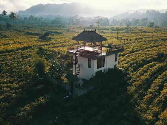 Лофт SunRice с крышей и завтраком Klungkung