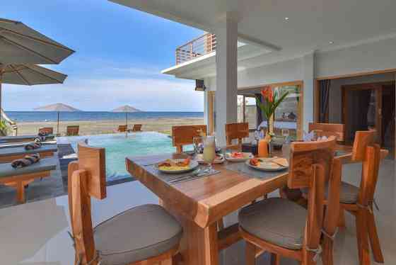 Вилла с частным бассейном Beach Front 4BR Villa @Lovina Area. Seririt