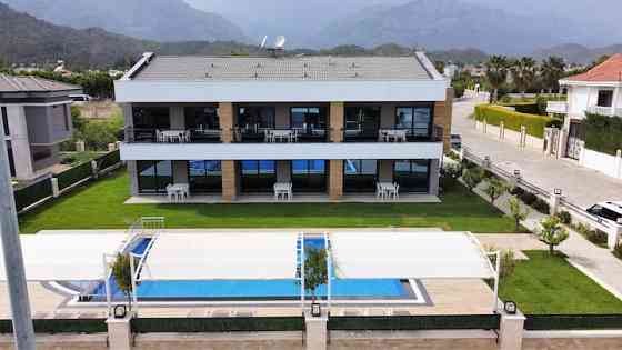 Sweet Home Kemer Apartments / E2 Kemer