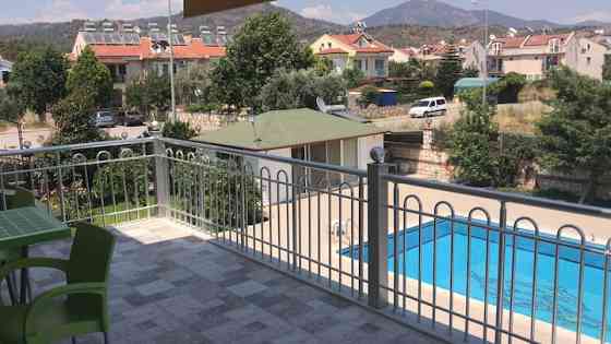 Апартаменты Sungarden с 2 спальнями и террасой на крыше Fethiye