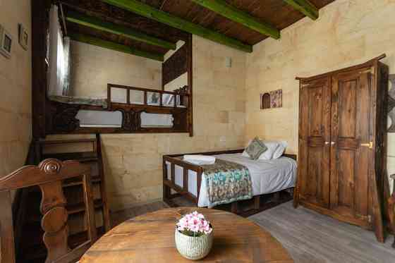 Каменная студия Cozy Rooms Goreme целиком UErguep