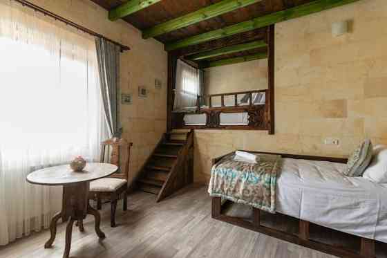 Каменная студия Cozy Rooms Goreme целиком UErguep