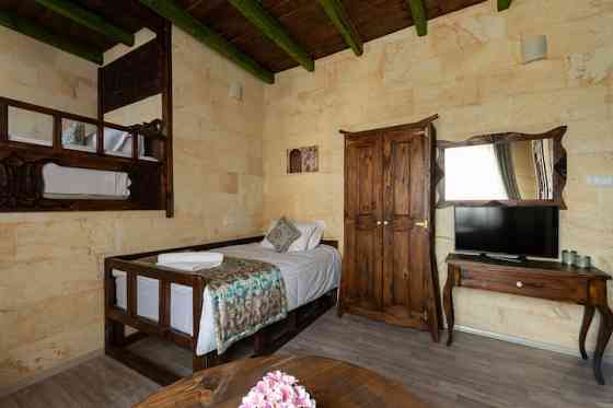 Каменная студия Cozy Rooms Goreme целиком UErguep