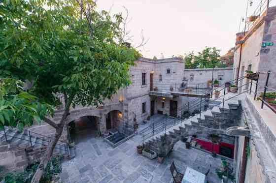 Четырехместный номер в отеле Century Cave UErguep