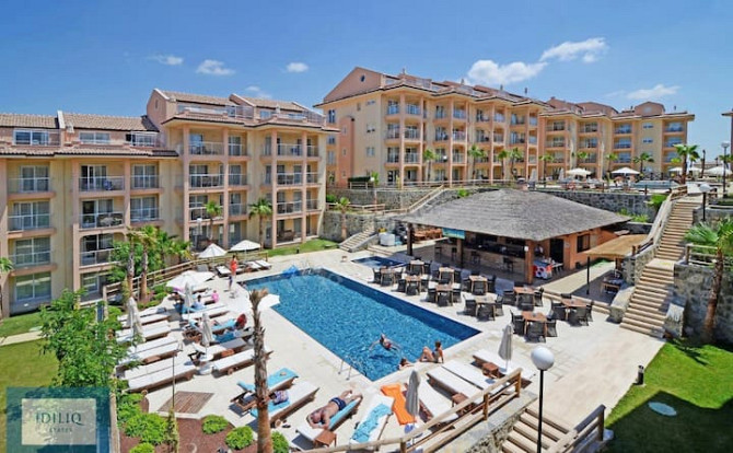 Поле для гольфа Wydnam Golf & Spa Resort Kusadasi 2+1 Сок - изображение 1