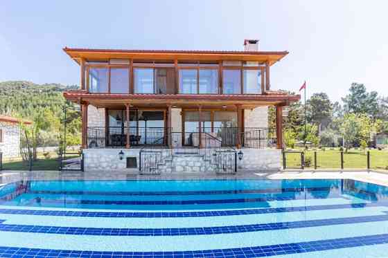 Вилла Hilltop Seaview Villa с садом и частным бассейном Beykonak