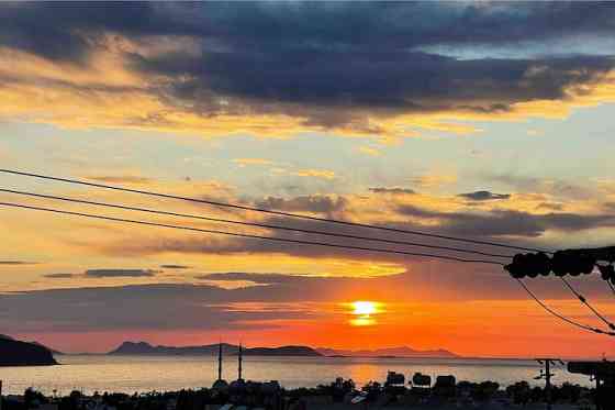 Прекрасный дом с потрясающим видом на закат и море Turgutreis