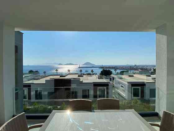 Апартаменты 3BR Terrace Apartment with Spectacular Sea View Turgutreis