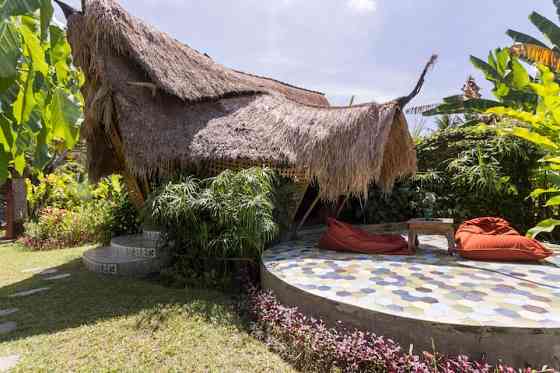 Коттедж Bamboo eco cottage в рисовых полях. Ubud